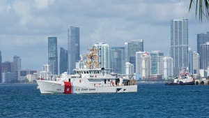 The U.S. Coast Guard ship Bernard C. Webber, leaves the coast guard base, Monday, July 19, 2021, in Miami Beach, Fla. The U.S. Coast Guard is searching for 39 people after a good Samaritan rescued a man clinging to a boat off the coast of Florida. (AP Photo/Marta Lavandier)