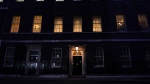 General view of the door of 10 Downing Street, in London, Wednesday, Jan. 26, 2022. British Premier Boris Johnson is bracing for the conclusions of an investigation into allegations of lockdown-breaching parties, a document that could help him end weeks of scandal and discontent, or bring his time in office to an abrupt close.(AP Photo/Alberto Pezzali)