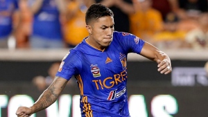 In this file photo, Tigres' Carlos Salcedo kicks the winning goal during the tie breaker against Club America during the second half of a UANL Leagues Cup semifinal Tuesday, Aug. 20, 2019, in Houston. (AP Photo/Michael Wyke) 