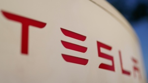 The logo for the Tesla Supercharger station is seen in Buford, Ga, April 22, 2021.  (AP Photo/Chris Carlson, File)