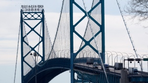 Traffic flows over the Ambassador Bridge in Detroit, Feb. 14, 2022 after protesters blocked the major border crossing for nearly a week in Windsor, Ont. (AP Photo/Paul Sancya)