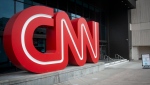 The CNN logo is displayed at the entrance to the CNN Center in Atlanta on Wednesday, Feb. 2, 2022. (AP Photo/Ron Harris) 