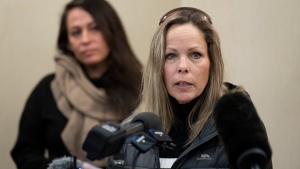 Tamara Lich, organizer for a protest convoy by truckers and supporters demanding an end to COVID-19 vaccine mandates, delivers a statement during a news conference in Ottawa, Thursday, Feb. 3, 2022. THE CANADIAN PRESS/Adrian Wyld