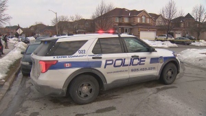 A Peel p;olice cruiser is shown at the scene of a homicide investigation in Brampton on Tuesday afternoon.