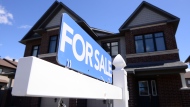 A new home is displayed for sale in a new housing development in Ottawa on Tuesday, July 14, 2020. THE CANADIAN PRESS/Sean Kilpatrick 