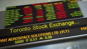 Financial numbers flow on the digital ticker tape at the TMX Group in Toronto's financial district on May 9, 2014. THE CANADIAN PRESS/Darren Calabrese