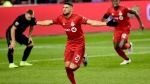 FILE - Toronto FC midfielder Jonathan Osorio (21) celebrates his second goal of the night during extra time MLS playoff soccer action against the D.C. United, in Toronto on Saturday, Oct. 19, 2019. THE CANADIAN PRESS/Frank Gunn 