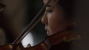 A member of the Toronto Symphony Orchestra plays the violin at a government announcement in Toronto on Monday, March 14, 2016. The Toronto Symphony Orchestra says it's drawing from its century-long history for its first full season of concerts in more than two years. The orchestra unveiled its 2022-2023 slate on Wednesday marking the institution's 100th anniversary. THE CANADIAN PRESS/Chris Young