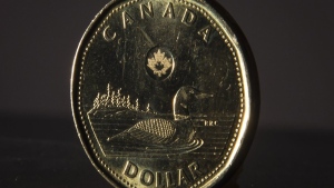 The Canadian dollar coin is pictured in North Vancouver, B.C. Wednesday, May 29, 2019. THE CANADIAN PRESS/Jonathan Hayward