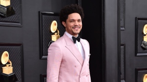Trevor Noah arrives at the 64th Annual Grammy Awards at the MGM Grand Garden Arena on Sunday, April 3, 2022, in Las Vegas. (Photo by Jordan Strauss/Invision/AP)