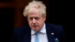 Britain's Prime Minister Boris Johnson leaves 10 Downing Street to attend the weekly Prime Ministers' Questions session in parliament in London, Wednesday, March 30, 2022. (AP Photo/Frank Augstein)