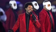 FILE - The Weeknd performs during the halftime show of the NFL Super Bowl 55 football game between the Kansas City Chiefs and Tampa Bay Buccaneers, on Feb. 7, 2021, in Tampa, Fla. The Weeknd, along with Swedish House Mafia, will replace rapper Ye, who changed his name from Kanye West, in a headlining spot at Coachella Valley Music and Arts Festival. (AP Photo/Ashley Landis, File)