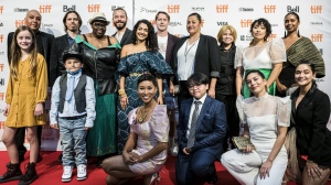 From left top row: Warren Greene, Robbie Teehan, Rhoma Spencer, Rich Williamson, Aaliyah Kanani, Conor Casey, Cherish Violet Blood, Essence Fox, Ellie Posadas, Nicole Simmons, (second row) Anna Claire Beitel, Felix Jedi Ingram Isaac, Catherine Hernandez, Liam Diaz, Shasha Nakhai, Kenya Jade Pinto pose for a photograph ahead of the premiere of Scarborough, the film adaptation of Catherine Hernandez’s award-winning novel, at the 2021 Toronto International Film Festival, Friday, Sept. 10, 2021. The movie was the top film winner at the Canadian Screen Awards. THE CANADIAN PRESS/Christopher Katsarov