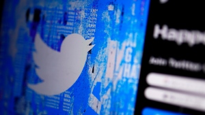 The Twitter splash page is seen on a digital device, Monday, April 25, 2022, in San Diego. (AP Photo/Gregory Bull)