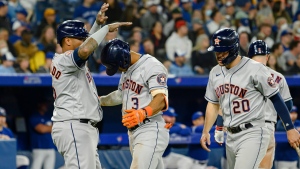 Houston Astros shortstop Jeremy Pena (3) celebrates with teammates after hitting a home run during the sixth inning of MLB baseball action against the Toronto Blue Jays in Toronto on Friday, April 29, 2022. THE CANADIAN PRESS/Christopher Katsarov