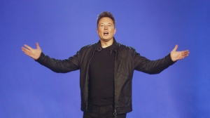 FILE - Tesla CEO Elon Musk introduces the Cybertruck at Tesla's design studio Thursday, Nov. 21, 2019, in Hawthorne, Calif. Musk has laid out some bold, if still vague, plans for transforming Twitter into a place of “maximum fun!” once he buys the social media platform for $44 billion and takes it private. (AP Photo/Ringo H.W. Chiu, File)