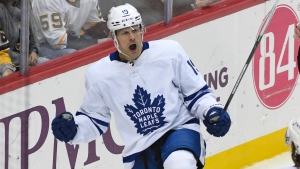 Toronto Maple Leafs' Jason Spezza (19) celebrates a goal during the first period of an NHL hockey game against the Toronto Maple Leafs, Saturday, Oct. 23, 2021, in Pittsburgh, Pa. (AP Photo/Fred Vuich) 