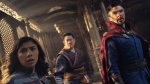This image released by Marvel Studios shows, from left, Xochitl Gomez as America Chavez, Benedict Wong as Wong, and Benedict Cumberbatch as Dr. Stephen Strange in a scene from "Doctor Strange in the Multiverse of Madness." (Marvel Studios via AP)