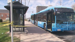 Police tape is shown beside a York Region Transit bus following a stabbing on Monday afternoon.