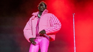 Young Thug performs on day four of the Lollapalooza Music Festival on Sunday, Aug. 1, 2021, at Grant Park in Chicago. The Atlanta rapper, whose name is Jeffrey Lamar Williams, was arrested Monday, May 9, 2022, in Georgia on conspiracy to violate the state's RICO act and street gang charges, according to jail records.  (Photo by Amy Harris/Invision/AP, File)