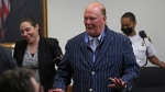Celebrity chef Mario Batali reacts after being found not guilty of indecent assault and battery at Boston Municipal Court on the second day of his trial, on Tuesday, May 10, 2022 in Boston. (Stuart Cahill/The Boston Herald via AP, Pool)