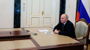 Russian President Vladimir Putin chairs a meeting with members of the Security Council via a video conference at the Kremlin in Moscow, Russia, Friday, May 13, 2022. (Mikhail Metzel, Sputnik, Kremlin Pool Photo via AP) 