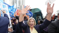 Ontario NDP Leader Andrea Horwath waves to supporters as she arrives for the Ontario election leaders’ debate in Toronto on Monday, May 16, 2022. THE CANADIAN PRESS/Frank Gunn
