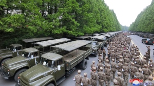 In this photo provided by the North Korean government, officers from the Korean People's Army medical units prepare for a deployment to help with the transport of medicine in Pyongyang, North Korea Monday, May 16, 2022. Independent journalists were not given access to cover the event depicted in this image distributed by the North Korean government. The content of this image is as provided and cannot be independently verified.   Korean language watermark on image as provided by source reads: "KCNA" which is the abbreviation for Korean Central News Agency. (Korean Central News Agency/Korea News Service via AP)