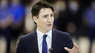 Prime Minister Justin Trudeau speaks during a press conference in Windsor, Ont. on Monday, May 2, 2022. Trudeau says a soccer friendly between Canada and Iran next month in Vancouver is ill-advised. THE CANADIAN PRESS/ Geoff Robins