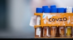 Specimens to be tested for COVID-19 are seen at LifeLabs after being logged upon receipt at the company's lab, in Surrey, B.C., on Thursday, March 26, 2020. THE CANADIAN PRESS/Darryl Dyck