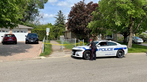 Police investigate after a woman dies during a severe thunderstorm in Brampton, Ont. (Corey Baird/CTV News Toronto)