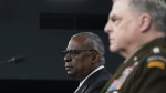 Secretary of Defense Lloyd Austin and Joint Chiefs Chairman Gen. Mark Milley, speak with reporters after a virtual meeting of the Ukraine Defense Contact Group at the Pentagon, Monday, May 23, 2022, in Washington. (AP Photo/Alex Brandon)