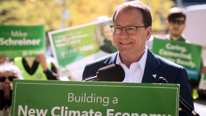 Ontario Green Party Leader Mike Schreiner smiles as supporters clap during a press conference at Bloor-Bedford Parkette in Toronto as part of his campaign tour, on Tuesday, May 17, 2022.  THE CANADIAN PRESS/ Tijana Martin