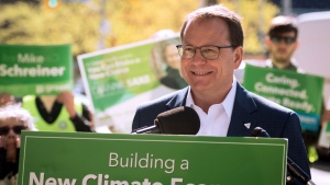 Ontario Green Party Leader Mike Schreiner smiles as supporters clap during a press conference at Bloor-Bedford Parkette in Toronto as part of his campaign tour, on Tuesday, May 17, 2022. THE CANADIAN PRESS/ Tijana Martin