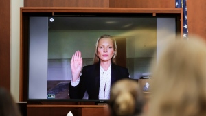 Model Kate Moss, a former girlfriend of actor Johnny Depp, testifies via video link at the Fairfax County Circuit Courthouse in Fairfax, Va., Wednesday, May 25, 2022. Depp sued his ex-wife Amber Heard for libel in Fairfax County Circuit Court after she wrote an op-ed piece in The Washington Post in 2018 referring to herself as a "public figure representing domestic abuse." (Evelyn Hockstein/Pool photo via AP)