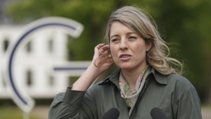 Melanie Joly, Foreign Minister of Canada, addresses the media during a statement as part of the meeting of foreign ministers of the G7 Group of leading democratic economic powers at the Weissenhaus resort in Weissenhaeuser Strand, Germany, Saturday, May 14, 2022. THE CANADIA PRESS/AP-Marcus Brandt/Pool via AP