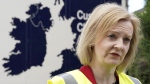 British Foreign Secretary Liz Truss speaks during a visit to McCulla Haulage to discuss the Northern Ireland protocol with businesses, in Lisburn, Northern Ireland, Wednesday May 25, 2022. THE CANADIAN PRESS/AP-Niall Carson/PA via AP