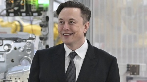 FILE - Tesla CEO Elon Musk attends the opening of the Tesla factory Berlin Brandenburg in Gruenheide, Germany, March 22, 2022. Twitter shareholders have filed a lawsuit accusing Musk of engaged in “unlawful conduct” aimed at sowing doubt about his bid to buy the social media company. The lawsuit filed late Wednesday, May 25, in the U.S. District Court for the Northern District of California claims the billionaire Tesla CEO has sought to drive down Twitter’s stock price because he wants to walk away from the deal or negotiate a substantially lower purchase price. (Patrick Pleul/Pool Photo via AP, File)