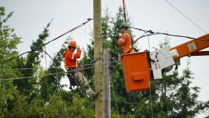 Hydro crews work to restore power in Clarence-Rockland, Ont., where a state of emergency is in place on Thursday, May 26, 2022.One week after severe thunderstorms swept through Ontario and Quebec, just over 60,000 homes in the two provinces remain without power today. THE CANADIAN PRESS/Sean Kilpatrick