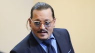 Actor Johnny Depp appears in the courtroom at the Fairfax County Circuit Courthouse in Fairfax, Va., Friday, May 27, 2022. Actor Johnny Depp sued his ex-wife Amber Heard for libel in Fairfax County Circuit Court after she wrote an op-ed piece in The Washington Post in 2018 referring to herself as a "public figure representing domestic abuse." (AP Photo/Steve Helber, Pool)