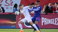 Chicago Fire FC’s Chris Mueller, left, fights off Toronto FC’s Alejandro Pozuelo during first half MLS soccer action in Toronto on Saturday, May 28, 2022. THE CANADIAN PRESS/Jon Blacker