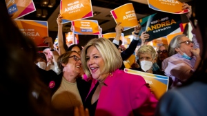 Ontario NDP Leader Andrea Horwath is greeted with supporters at her election night event in Hamilton, Ont., Thursday, June 2, 2022. THE CANADIAN PRESS/Tara Walton 