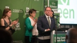 Ontario Green Party Leader Mike Schreiner, delivers his acceptance speech from his election night event in Guelph, Ont., after being re-elected, on Thursday, June 2, 2022. THE CANADIAN PRESS/ Tijana Martin