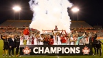 Toronto FC celebrates their win over Forge FC in the 2020 Canadian Championship Final soccer in Hamilton, Ont. on Saturday, June 4, 2022. THE CANADIAN PRESS/Peter Power