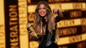 Jennifer Lopez accepts the generation award at the MTV Movie and TV Awards on Sunday, June 5, 2022, at the Barker Hangar in Santa Monica, Calif. (AP Photo/Chris Pizzello)