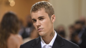 Justin Bieber attends The Metropolitan Museum of Art's Costume Institute benefit gala in New York on September 13, 2021. Bieber says he's been diagnosed with Ramsay Hunt Syndrome, a virus that has left the right side of his face paralyzed. THE CANADIAN PRESS/AP, Invision - Evan Agostini