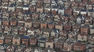 An aerial view of houses in Oshawa, Ont. is shown on Saturday, Nov. 11, 2017. As Canadians who bought a home years ago renew their mortgages, they will almost certainly face higher mortgage rates than when they bought and a rise in their monthly payments. THE CANADIAN PRESS/Lars Hagberg