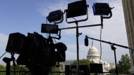 Media set up before the House select committee investigating the Jan. 6 attack on the U.S. Capitol holds its second public hearing to reveal the findings of a year-long investigation, on Capitol Hill, Monday, June 13, 2022, in Washington. (AP Photo/Andrew Harnik)