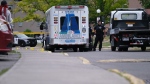 Police are on the scene of a shooting on Lotherton Pathway, in the Caledonia Road and Lawrence Avenue West area, on Sunday, June 19, 2022. (Simon Sheehan/CP24)