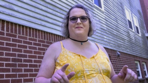 Charlotte Landry, a transgender woman, stands near her residence in Dartmouth, N.S., on Wednesday, June 22, 2022. Landry considers herself lucky because she has a primary-care provider who supported her gender-affirming treatment, which is important to the mental health and well-being of trans and non-binary people, but she says problems still exist for many who require similar support. THE CANADIAN PRESS/Andrew Vaughan